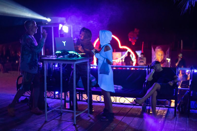 A VJ running visuals at a psytrance party